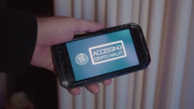 Telefondaki kripto cüzdana erişiliyor. Uygulamalı telefon ekranı videosu benim tarafımdan oluşturuldu ve telefonda görüntülendi..