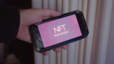 NFT, benim oluşturduğum ve telefonda gösterilen bir telefon ekran videosundan alınıyor..