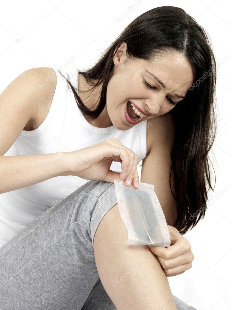 Young Woman Waxing Legs