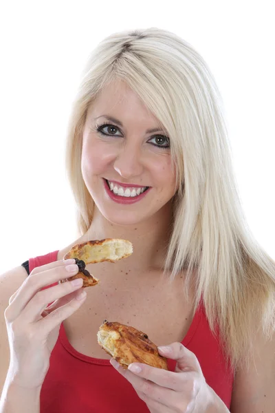 Mujer joven comiendo — Foto de Stock