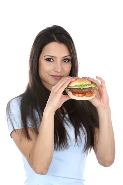 Mujer comiendo una hamburguesa de carne — Foto de Stock