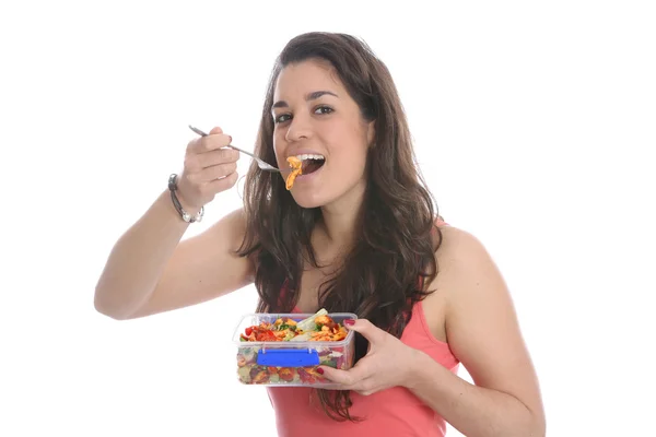 Jovem mulher comendo — Fotografia de Stock