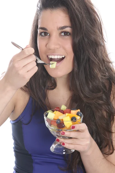 Jovem mulher comendo — Fotografia de Stock