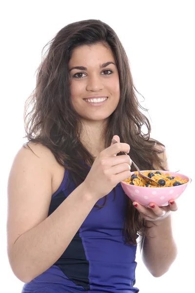 Jovem mulher comendo — Fotografia de Stock