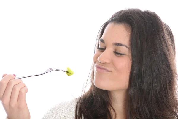 Jonge vrouw eten — Stockfoto