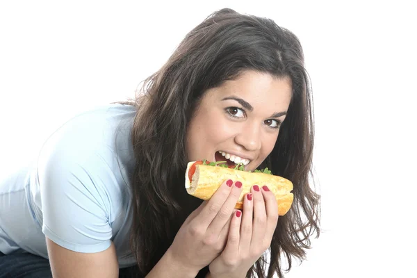 Jovem mulher comendo — Fotografia de Stock