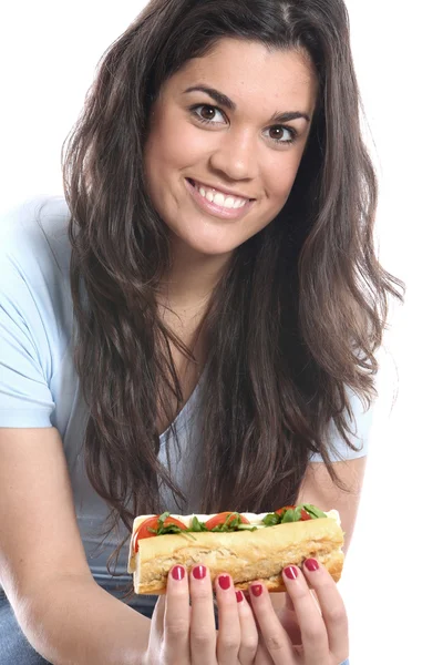Junge Frau beim Essen — Stockfoto