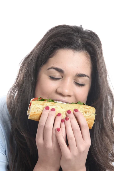 Jovem mulher comendo — Fotografia de Stock