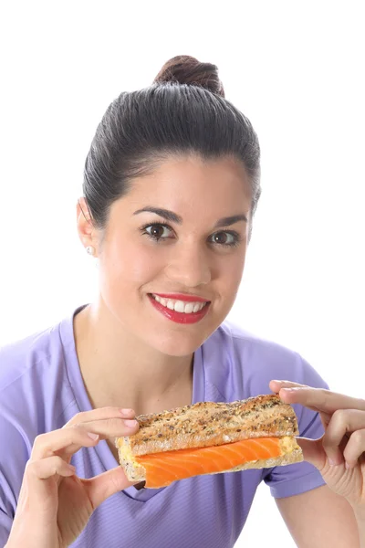 Atraente jovem mulher comer — Fotografia de Stock