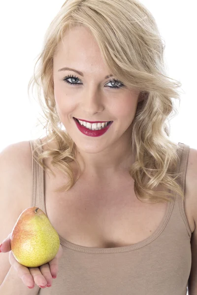 Young Woman Holding a Fresh Pear — Stock Photo, Image