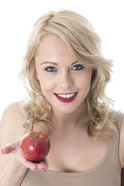 Mujer joven sosteniendo una manzana roja —  Fotos de Stock