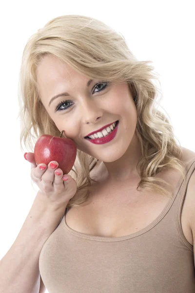 Mujer joven sosteniendo una manzana roja —  Fotos de Stock