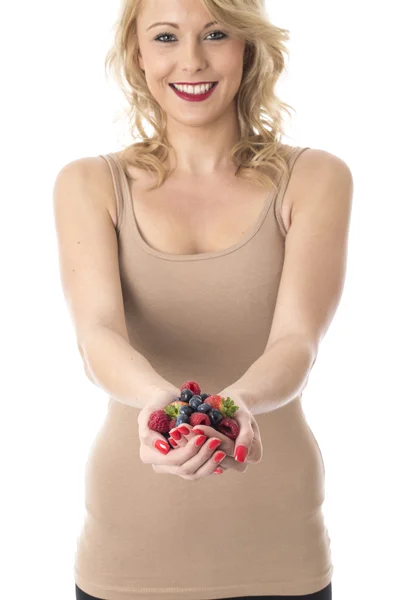 Young Woman Holding a Handful of Mixed Berries — Stock Photo, Image