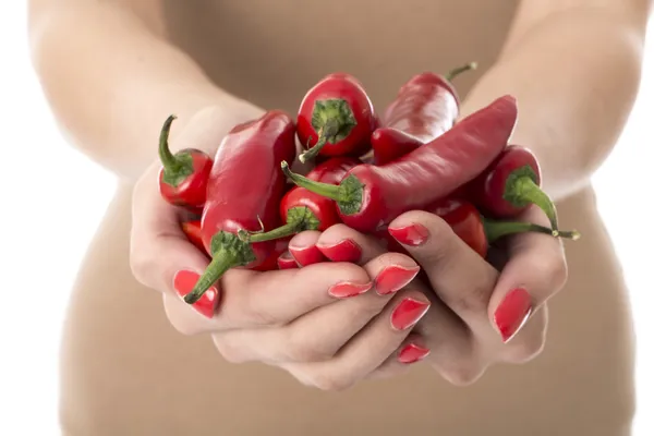 Attractive Young Woman Holdiung a Hanful of Red Chilli Peppers — Stock Photo, Image