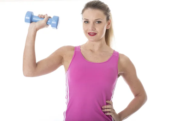 Junge Frau mit stummem Glockengewicht — Stockfoto