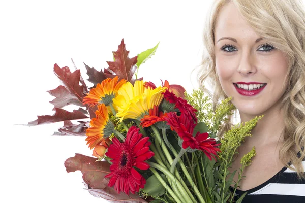 Attractive Young Woman Holding a Bunch of Flowers — Stock Photo, Image