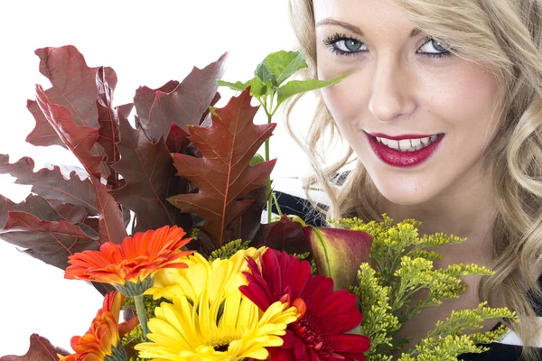 Attractive Young Woman Holding a Bunch of Flowers — Stock Photo, Image