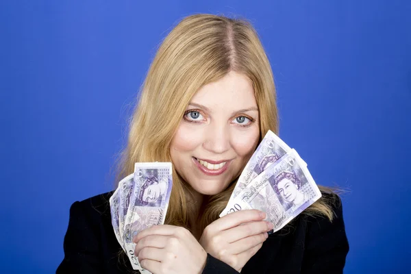 Atractiva joven mujer sosteniendo dinero — Foto de Stock