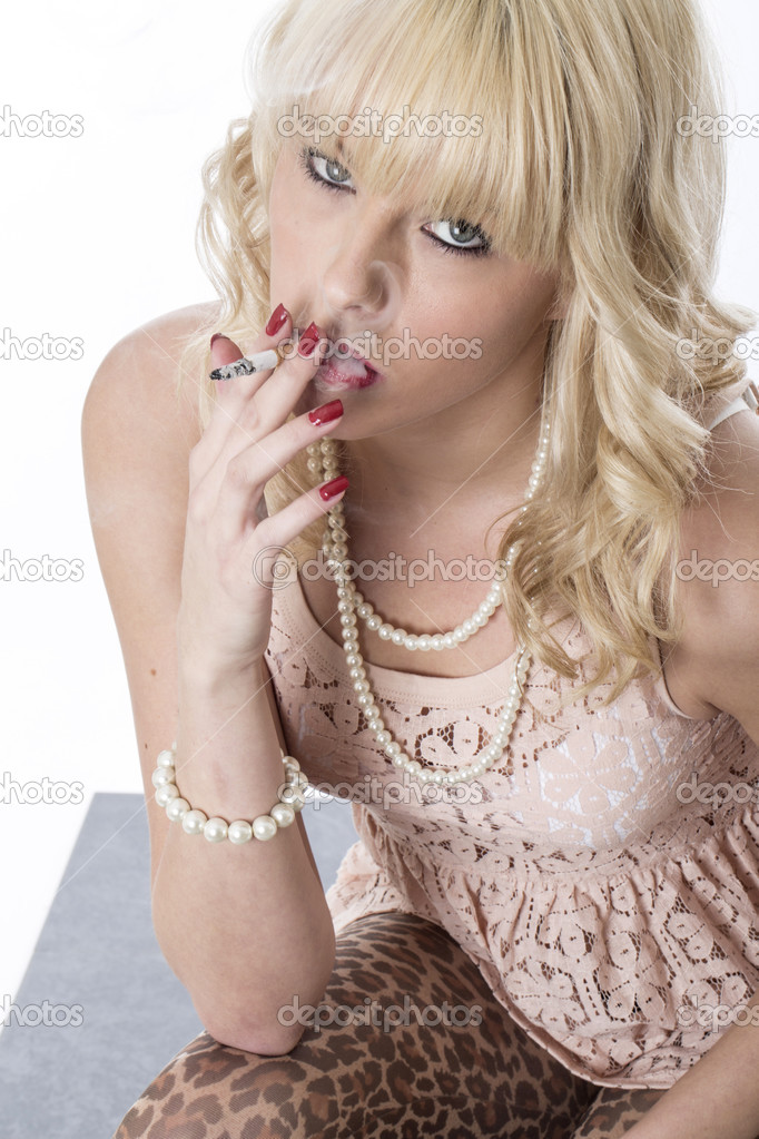 Attractive Young Woman Smoking