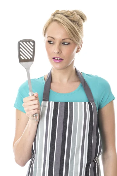 Young Woman Holding a Kitchen Slice — Stock Photo, Image