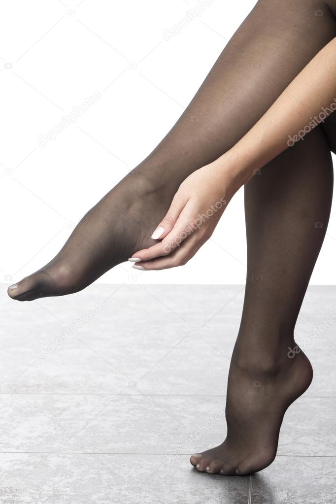 Close Up of a Model Wearing Black Stockings Stock Photo by