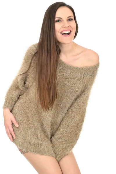 Sexy junge Frau trägt Strümpfe und einen Pullover — Stockfoto