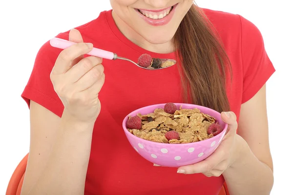 Gelukkig jonge vrouw eten ontbijtgranen — Stockfoto