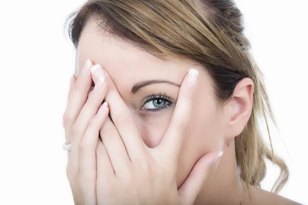 Aantrekkelijke jonge vrouw gluren — Stockfoto