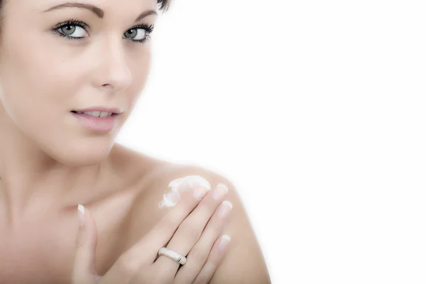 Attractive Young Woman Applying Moisturizing Cream — Stock Photo, Image