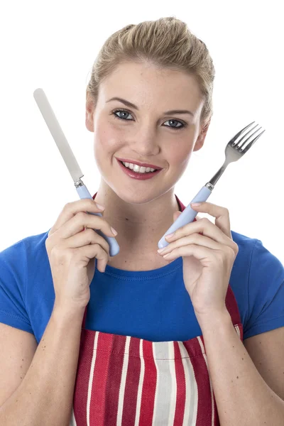 Aantrekkelijke jonge vrouw bedrijf bestek — Stockfoto