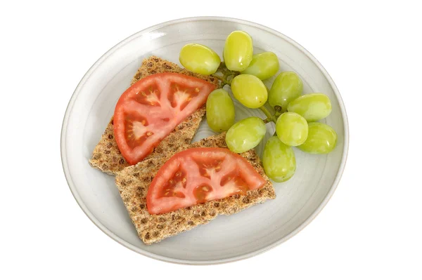 Rye Crispbread Crackers with Tomatoes and Grapes — Stock Photo, Image