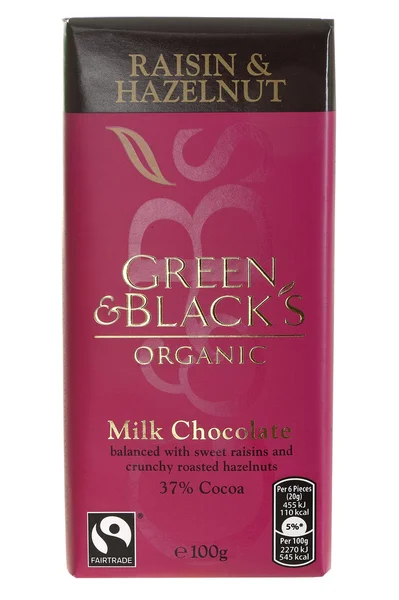 Greens and Black Raisin and Hazelnut Chocolate Bar — Stock Photo, Image