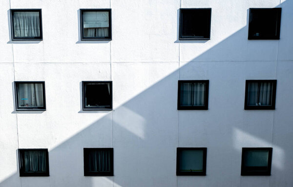 Epsom Surrey London UK, April 06 2022, Modern Abstract Geometric High Rise Residential Building Exterior Window Details With No People