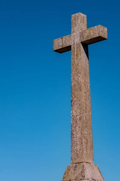 Dorking Surrey Hills UK, July 08 2022, Churchyard Religious Cross Against A Blue Sky With No People