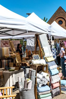Dorking, Surrey Hills, London UK, July 07 2022, People Or Shoppers Browsing Street Market Stalls On A Sunny Day