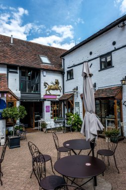 Dorking, Surrey Hills, London UK, August 14 2022, Traditional Old Courtyard Cafe Or Restaurant With Tables And Chairs And No People