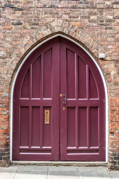 Dorking, Surrey Hills, London UK, August 14 2022, Heavy Refurbished Traditional Wooden Door In A Construction Refurbishment Project