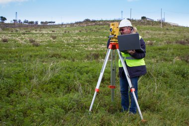 engineer with theodolite clipart