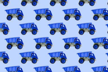 Renkli mavi plastik damperli kamyon, bahşiş kamyonu, beyaz arka planda izole edilmiş araba oyuncağı hala kusursuz desen, model, şablon, çocuklar için oyuncaklar, oğlanlar, kızlar, gelişim, oyun, çocukluk.