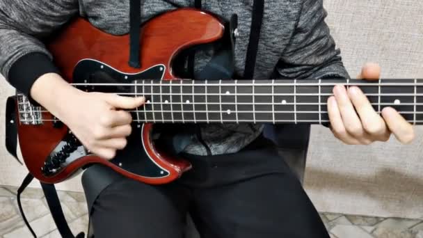 Musician Male Having Fun Playing Electric Bass Guitar Living Room — Stockvideo