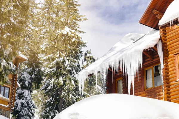 Wooden Village Rural House Mansion Hotel Covered Snow Big Icicles Royalty Free Stock Images