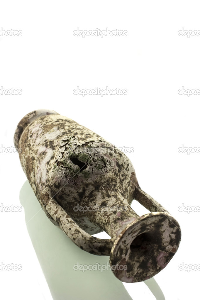 Ceramic amphora isolated in a white brackground