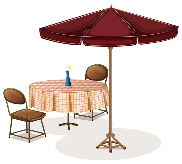 En tabell med ett paraply på ett kafé — Stock vektor