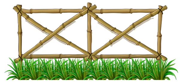 En bambu staket med gräs — Stock vektor