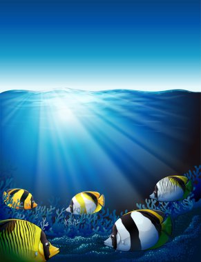 Fishes under the sea with sunlight clipart