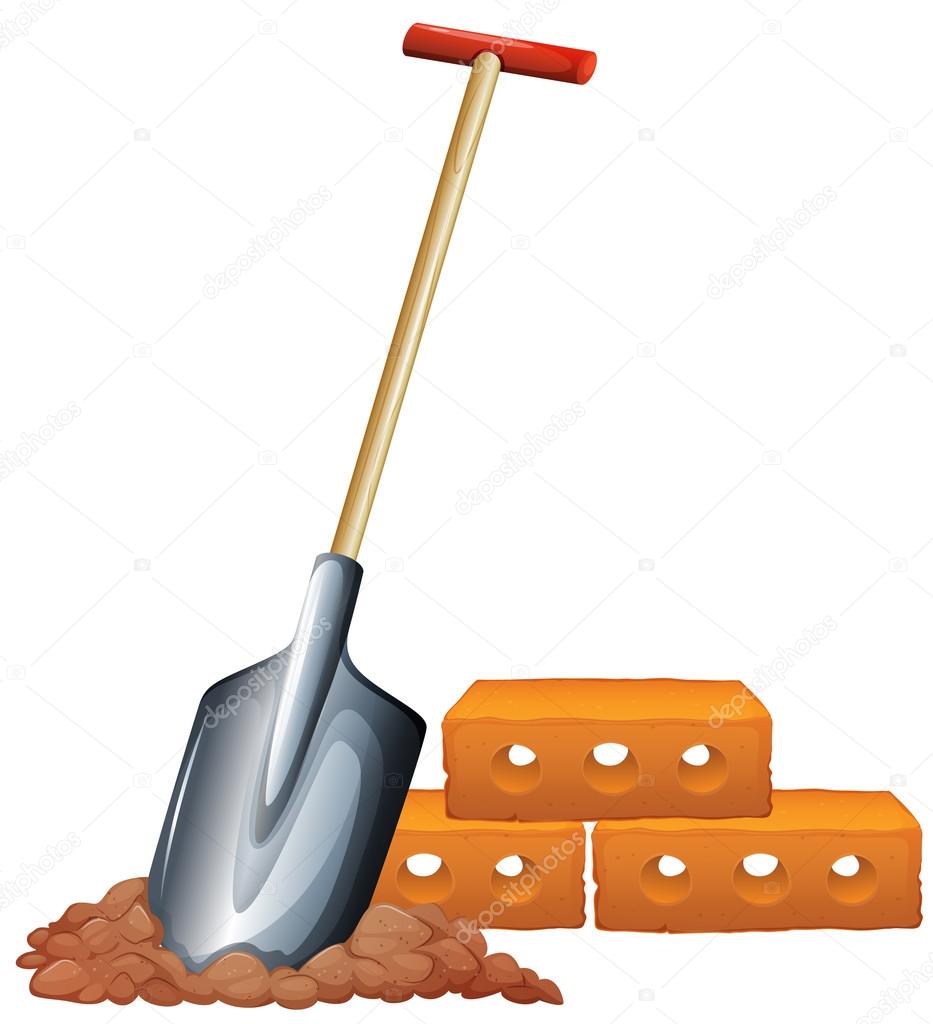 A shovel and bricks