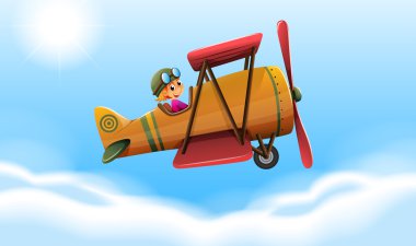 gülümseyen bir pilotla uçan bir uçak