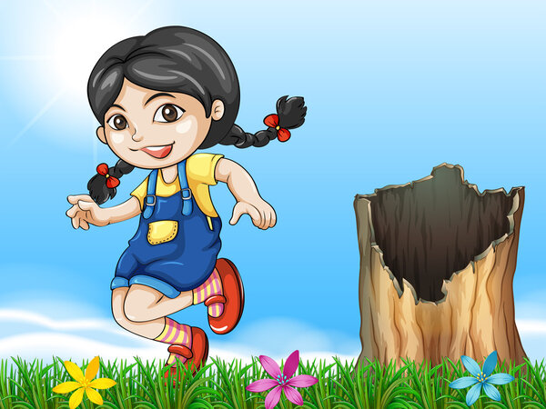 A girl playing beside the stump