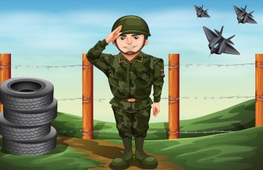 bir askerin önünde barbwire çit