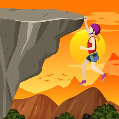 Gün batımında kayalıklarda kaya tırmanışçısı